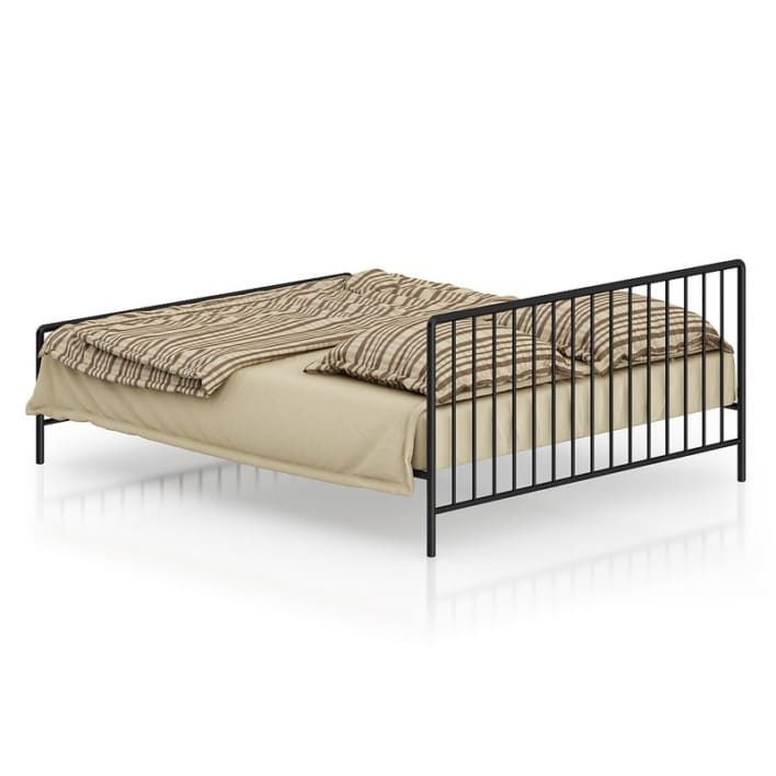 Metal Bed with Striped Bedclothes