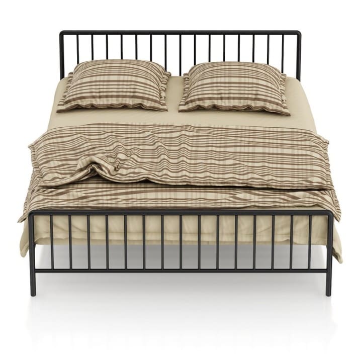 Metal Bed with Striped Bedclothes