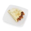 Bitten beef in tortilla