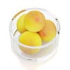 Grapefruits in glass bowl