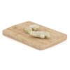 Sliced Ginger on Wooden Board