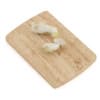 Sliced Ginger on Wooden Board