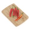 Chilli Pepper on Wooden Board