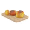 Sliced Bun with Poppy Seeds on Wooden Board