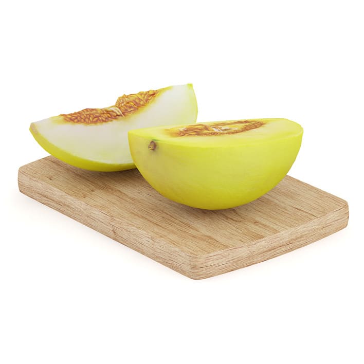 Halved Yellow Melon on Wooden Board