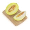 Halved Yellow Melon on Wooden Board