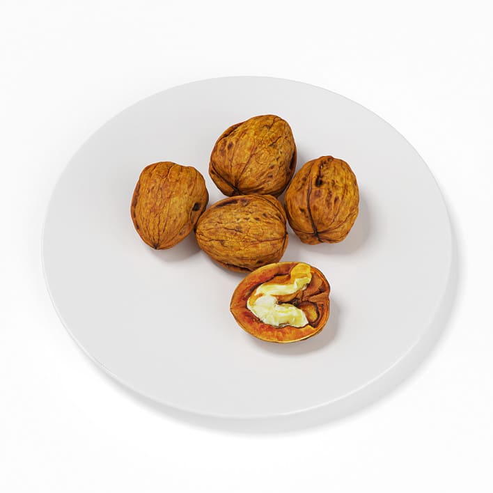 Walnuts on White Plate